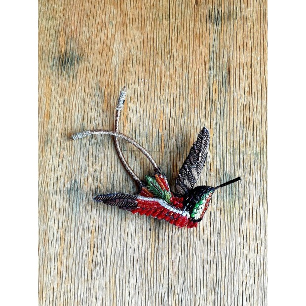 Trovelore sagė purpurinis kolibris